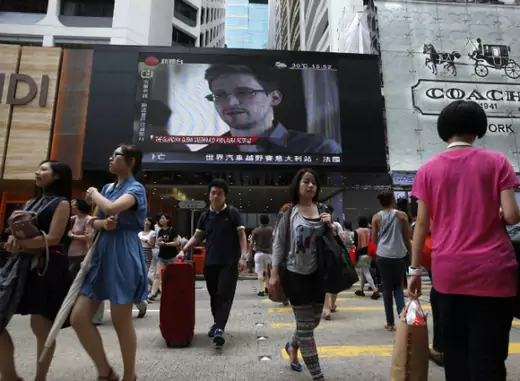 Snowden on news monitor in China