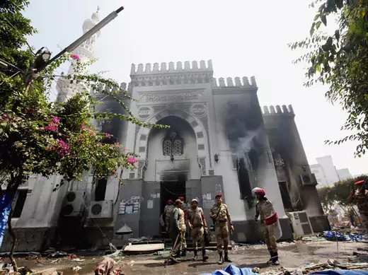 Military police stand outside the Rabaa Adawiya mosque in Cairo on August 15 (Mohamed Abd El Ghany/ Courtesy Reuters).