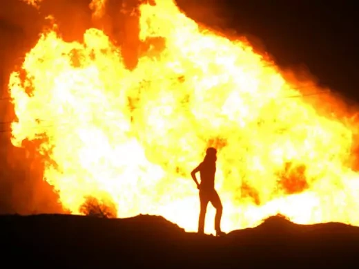Flames rise from an Egyptian pipeline distribution station after an attack in the Sinai peninsula July 12, 2011 (Courtesy Reuters).