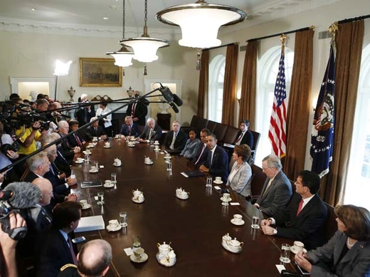 President Barack Obama discusses a military response to Syria with bipartisan Congressional leaders in the Cabinet Room at the White House (Larry Downing/Courtesy Reuters).