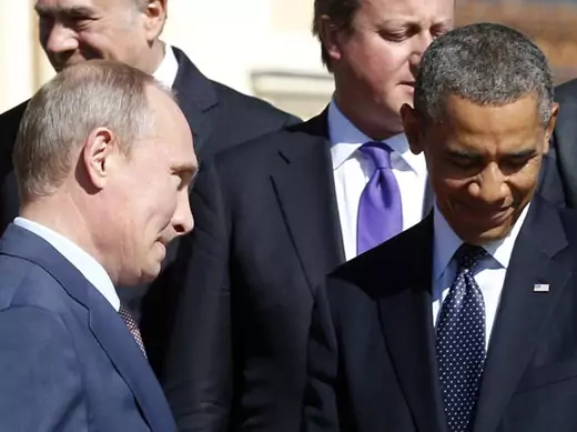 Russian president Vladimir Putin walks past U.S. president Barack Obama during a group photo at the G20 summit in St. Petersburg (Kevin Lamarque/Courtesy Reuters).