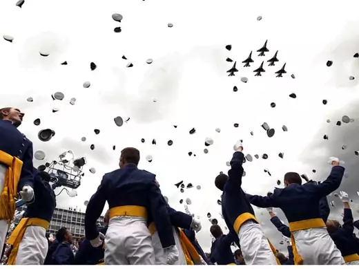 The Thunderbirds fly past as graduates celebrate at the Air Force Academy commencement ceremony in Colorado Springs (Kevin Lamarque/Courtesy Reuters).