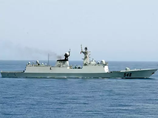 The Chinese People's Liberation Army (Navy) frigate Yi Yang transits the Gulf of Aden prior to conducting a bilateral counter-piracy exercise with the guided-missile destroyer USS Winston S. Churchill in the Gulf of Aden on September 17, 2012. (Aaron Chase, U.S. Navy/Courtesy Reuters)