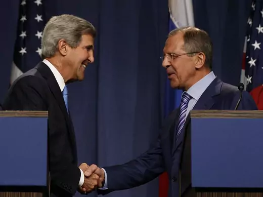 U.S. Secretary of State Kerry shakes hands with Russian Foreign Minister Lavrov after delivering opening remarks to the media before their meeting to discuss the ongoing crisis in Syria, in Geneva