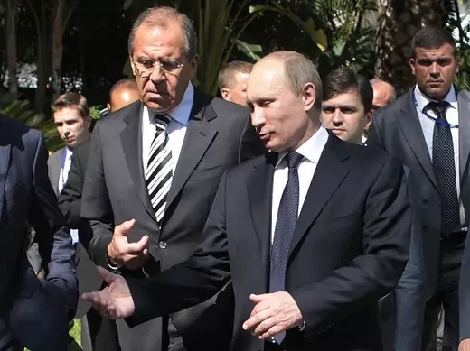 Russia's President Putin leaves a BRICS meeting next to Foreign Minister Lavrov in Los Cabos