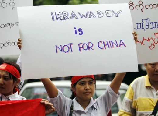 Myanmareses living in Malaysia display placards in protest against the Myitsone dam project, outside Myanmar embassy in Kuala Lumpur on September 22, 2011. (Bazuki Muhammad/Courtesy Reuters) 