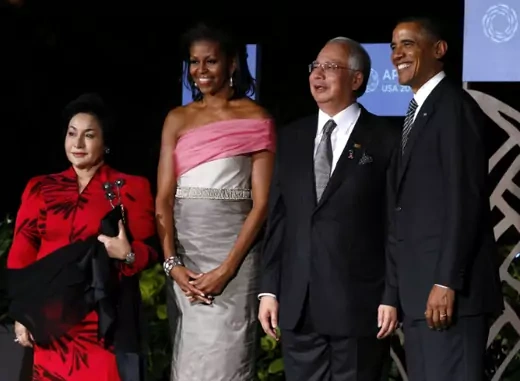 U.S. President Barack Obama and first lady Michelle Obama greet Malaysia's Prime Minister Najib Razak and his wife Rosmah Mansor as they arrive at the opening dinner of the APEC Leaders Summit in Honolulu, Hawaii on November 12, 2011. President Obama will be visiting Malaysia in October 2013. (Jim Young/Courtesy Reuters) 