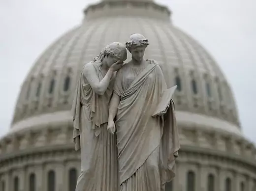 The statue of Grief and History stands in front of the U.S. Capitol dome in Washington (Kevin Lamarque/Courtesy Reuters).