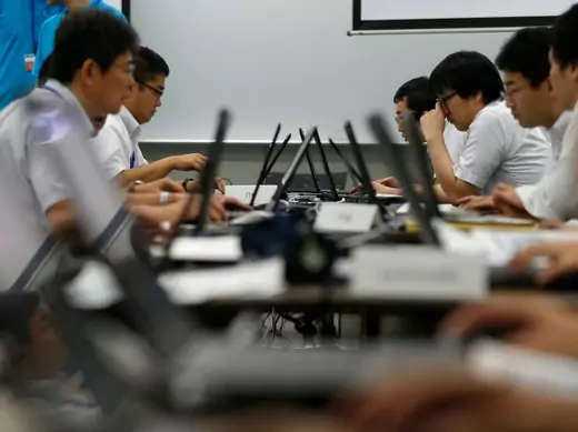 Participants from government ministries and agencies take part in the Cyber Defense Exercise with Recurrence (CYDER) in Tokyo on September 25, 2013. (Toru Hanai/Courtesy Reuters)