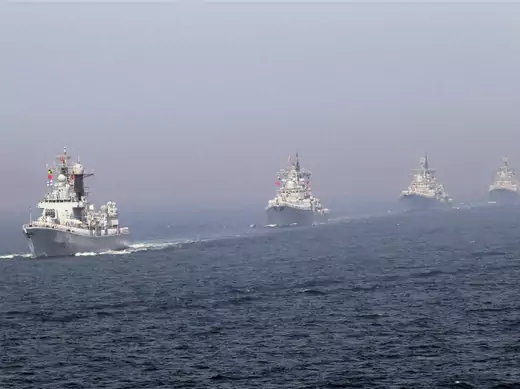 Chinese missile destroyers navigate during the fleet's review of the China-Russia joint naval exercise in the Yellow Sea on April 26, 2012 (China Daily/Courtesy Reuters).