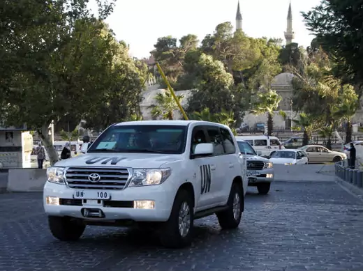 UN vehicles transporting a team of experts from the Organization for the Prohibition of Chemical Weapons are pictured as they return to their hotel in Damascus October 3, 2013 (al-Hariri/Courtesy Reuters).