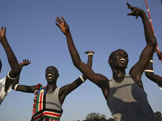 Men sing and dance as they celebrate referendum results in Abyei October 31, 2013.
