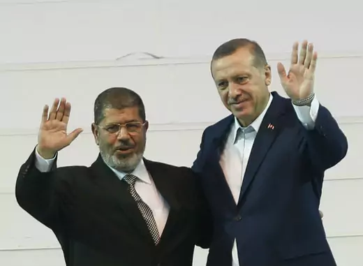 Prime Minister Recep Tayyip Erdogan (R) hosts ousted Egyptian President Mohammed Morsi (L) in Ankara on September 30, 2012.