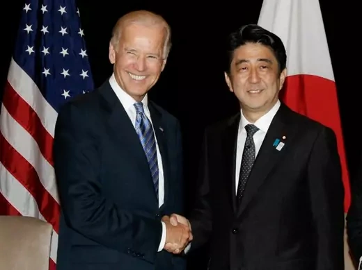 U.S. Vice President Joe Biden shakes hands with Japan's Prime Minister Shinzo Abe (R) during their bilateral meeting in Singapore on July 26, 2013 (Tim Chong/Courtesy Reuters). 