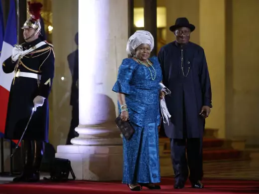 Nigeria's President Goodluck Jonathan and his wife Patience arrive for a dinner with the French President and other dignitaries as part of the Summit for Peace and Security in Africa at the Elysee Palace in Paris, December 6, 2013. 