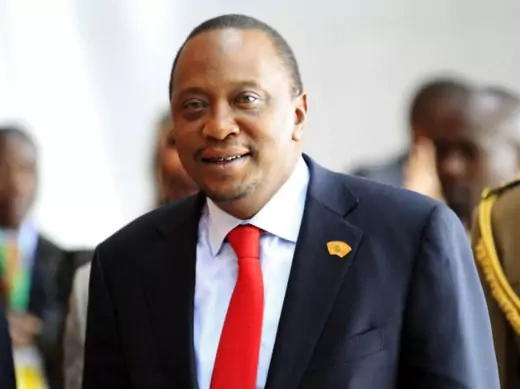 Kenya's President Uhuru Kenyatta arrives for the extraordinary session of the African Union's Assembly of Heads of State and Government on the case of African Relationship with the International Criminal Court (ICC), in Ethiopia's capital Addis Ababa, October 12, 2013.