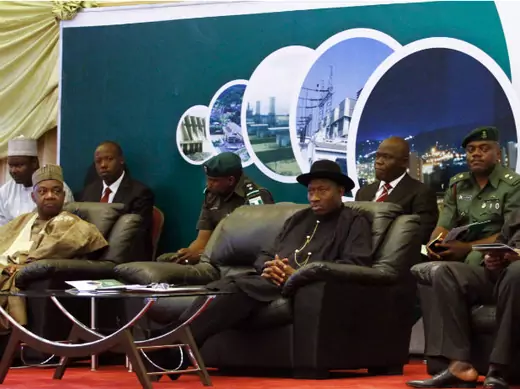 (Front seated, from L to R) Nigeria's Vice President Namadi Sambo, President Goodluck Jonathan and Secretary to the Government of the Federation (SGF) Anyim Pius Anyim attend the opening of the Presidential Power Reform Transaction signing summit in Abuja April 22, 2013. 