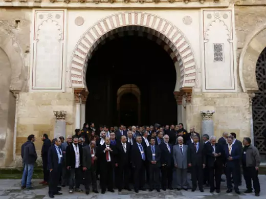 Members of Syrian opposition groups stand after visiting the former mosque of Cordoba during a consultative meeting in Cordoba, southern Spain January 9, 2014 (del Pozo/Courtesy Reuters).