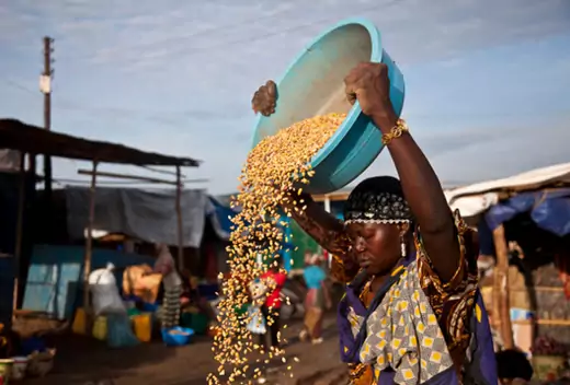 A woman sets up her shop at the Konyo Konyo market in Juba, South Sudan, May 12, 2012.