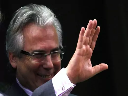 Spanish judge Baltasar Garzon waves as he attends the opening of the 130th term of the Argentina's Congressional ordinary sessions inside the Congress building in Buenos Aire