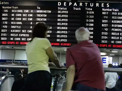 Passengers wait for a train at New York's Penn Station. (Shannon Stapleton/Courtesy Reuters)