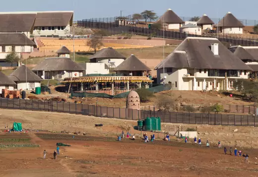 A general view of the Nkandla home (behind the huts) of South Africa's President Jacob Zuma in Nkandla August 2, 2012.