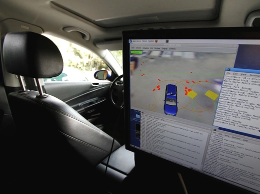 A monitor in the back seat displays sensor readings and other information in a driverless car at the Volkswagen Automotive Innovation Laboratory at Stanford University (Kevin Bartram/Courtesy Reuters).