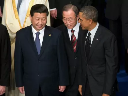  U.S. President Barack Obama, U.N. Secretary-General Ban Ki-moon and China's President Xi Jinping talk during a family photo at the Nuclear Security Summit in The Hague March 25, 2014.  (Doug Mills/Courtesy Reuters)