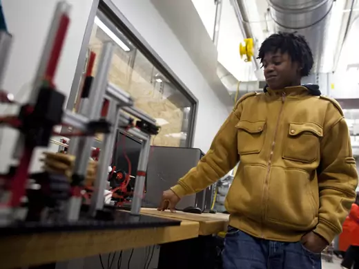 Yaun Smith, a senior, talks about his class's assembly line to make a s’more as a class project as part of the Project Lead the Way class at Bradley Tech High School in Milwaukee, Wisconsin (Darren Hauck/Courtesy Reuters).