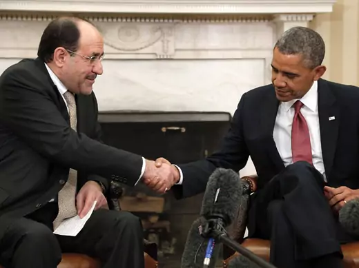 U.S. President Barack Obama (R) shakes hands with Iraq's Prime Minister Nouri al-Maliki (L) after their meeting in the Oval Office at the White House in Washington, November 1, 2013 (Jonathan Ernst/Courtesy Reuters).
