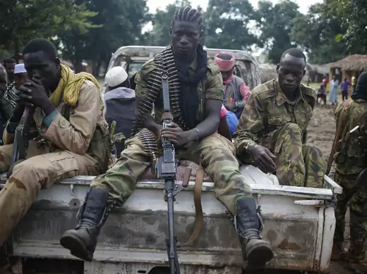 Seleka fighters take a break as they sit on a pick-up truck in the town of Goya, June 11, 2014.  (Goran Tomasevic/Courtesy Reuters)