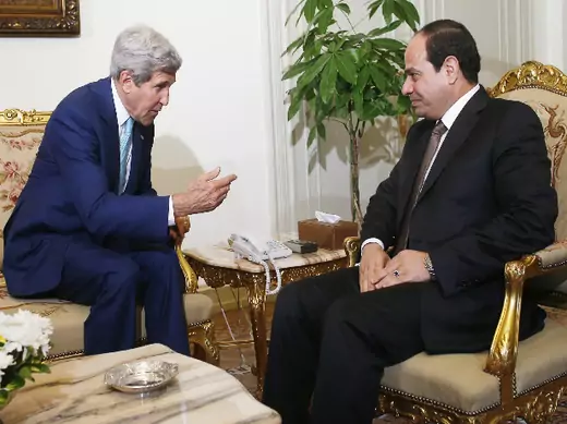 U.S. Secretary of State John Kerry (L) speaks with Egyptian President Abdel Fattah al-Sisi in Cairo July 22, 2014 (Dharapak/Courtesy Reuters).