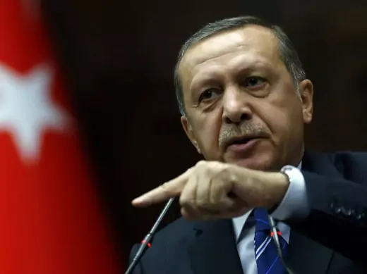 Turkish Prime Minister Recep Tayyip Erdogan speaks before members of parliament from his Justice and Development Party (AKP) in Ankara on April 29, 2014.