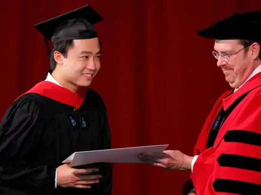 Bo Guagua, son of fallen Chinese politician Bo Xilai, receives his masters degree in public policy from Senior Lecturer John Donohue (R) at the John F. Kennedy School of Government during the 361st Commencement Exercises at Harvard University in Cambridge, Massachusetts May 24, 2012. Bo graduated from Harvard University's Kennedy School of Government on Thursday, capping a tumultuous academic year that also placed him in the center of his homeland's biggest leadership crisis in two decades. REUTERS/Brian S