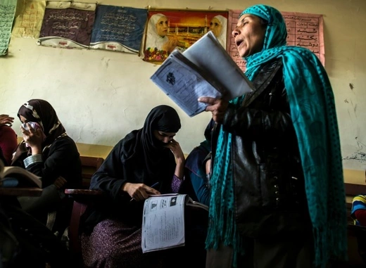 Afghan women take part in a literacy class at the Organisation of Promoting Afghan Women's Capabilities (OPAWC) center in Kabul, Afghanistan, March 2014 (Courtesy Reuters/Zohra Bensemra).