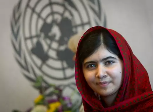 Pakistani schoolgirl activist Malala Yousafzai poses for pictures at the United Nations in New York, New York, August 2014 (Courtesy Reuters/Carlo Allegri).