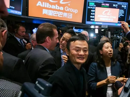 Alibaba Group Holding Ltd. founder Jack Ma greets traders at the New York Stock Exchange as he celebrates the company's initial public offering (IPO) under the ticker "BABA", in New York on September 19, 2014. (Lucas Jackson/Courtesy Reuters)