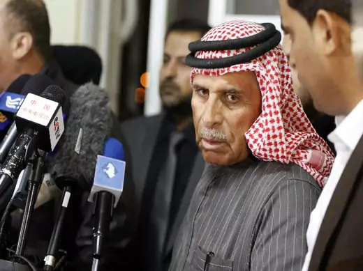 Safi Yousef (2nd R), father of Islamic State captive Jordanian pilot Muath al-Kasaesbeh, speaks at a news conference where he asked for Islamic State to pardon and release his son, in Amman January 29, 2015 (Hamed/Courtesy Reuters).