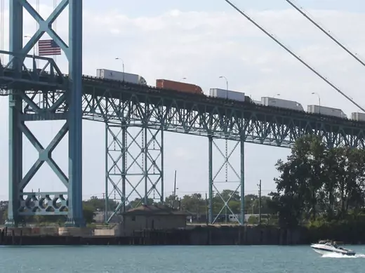 Commercial trucks line up on the Ambassador bridge crossing over to Detroit, Michigan from Windsor, Ontario (Rebecca Cook/Courtesy Reuters).