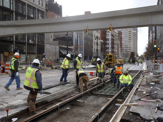 Construction on the M-1 3.3-mile light rail transit project is seen along Woodward Avenue near downtown Detroit, Michigan, November 7, 2014 (Rebecca Cook/Courtesy Reuters).