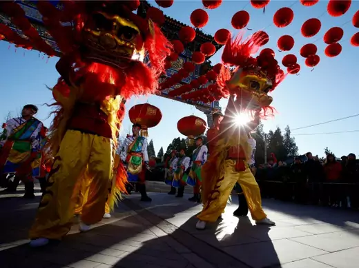 Lion dancers perform for the opening of the Temple Fair, as part of Chinese New Year celebrations, at Ditan Park, also known as the Temple of Earth, in Beijing, February 18, 2015. The Chinese Lunar New Year on Feb. 19 will welcome the Year of the Sheep (also known as the Year of the Goat or Ram).  REUTERS/Kim Kyung-Hoon (CHINA - Tags: SOCIETY)