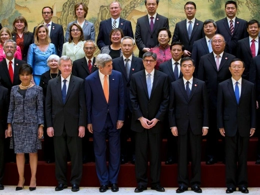 U.S. Secretary of State John Kerry (centre L) and U.S. Treasury Secretary Jack Lew (centre R) pose for a group photo with Chinese officials after attending the opening ceremony of the U.S.-China Strategic and Economic Dialogue, "S&ED" at the Diaoyutai State Guesthouse in Beijing July 9, 2014. REUTERS/Andy Wong/Pool (CHINA - Tags: POLITICS)