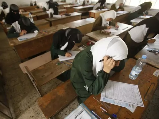 Girls take the final examination of their primary school in Sanaa, Yemen, June 2013 (Courtesy Khaled Abdullah/Reuters).