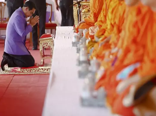 Thailand's Prime Minister Prayuth Chan-ocha prays as he takes a part in the merit-making ceremony on the occasion of Princess Maha Chakri Sirindhorn's birthday at Sanam Luang in Bangkok on April 2, 2015. (Damir Sagolj/Courtesy: Reuters) 