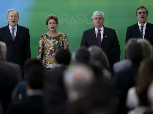 Brazil's President Supreme Court's Lewandowski, President Rousseff, Prosecutor-General Janot and Justice Minister Cardozo sing the Brazilian national anthem during the ceremony in Brasilia