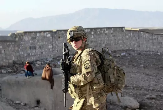 A U.S. female soldier patrols in Pachir wa Agam district in Nangarhar
