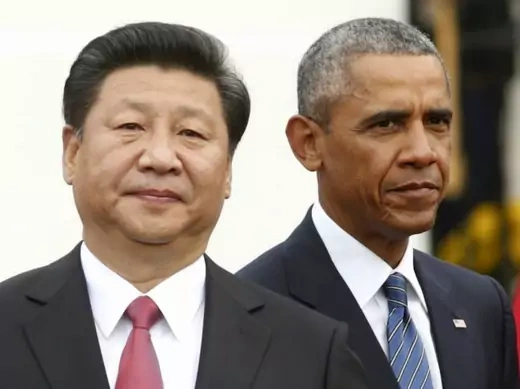 U.S. President Barack Obama stands with Chinese President Xi Jinping during an arrival ceremony at the White House in Washington September 25, 2015. Later that day, the two leaders announced a landmark agreement on cyber espionage. (Kevin Lamarque/Reuters)