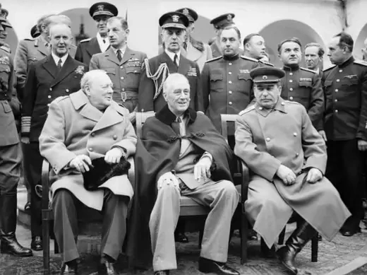 Winston Churchill, Franklin D. Roosevelt, and Joseph Stalin sit for photographs during the Yalta Conference in February 1945.