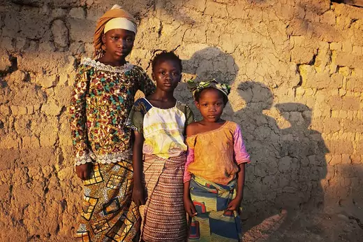 Girls pose for a portrait in eastern Sierra Leone
