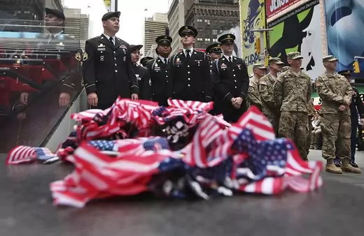 United States Army soldiers stand before the start of the Army's 237th anniversary celebrations at Times Square in New York